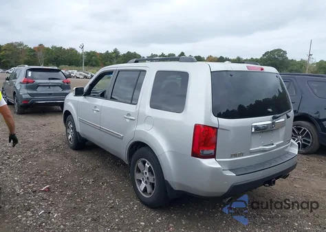 2009 Honda Pilot Touring z USA, uszkodzony, nr VIN 5FNYF48959B020092